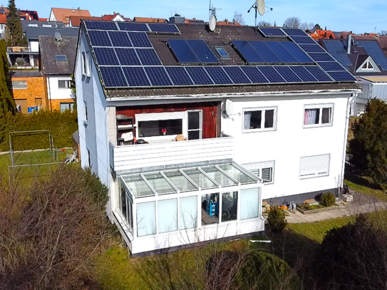 Attraktives Mehrfamilienhaus mit drei Wohneinheiten, Solaranlage und Photovoltaik, Doppelgarage, ca. 304 m² Wohnfläche…