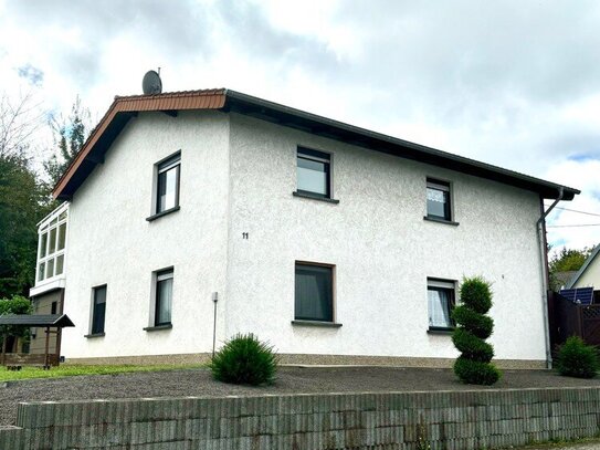 Freistehendes gepflegtes Einfamilienhaus mit Wintergarten + Garage