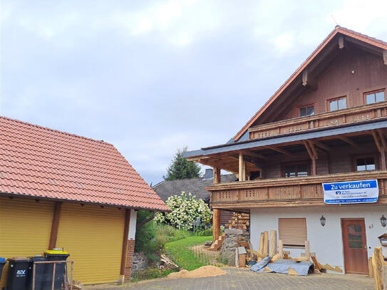 Einzigartiges Einfamilien-Holzhaus mit warmem Wohnambiente in Freiensteinau