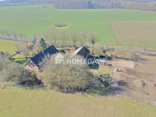 Attraktive Maisonette-Wohnung im Bauernhaus mit 4 Zimmern, Garten und Terrasse in Holtsee