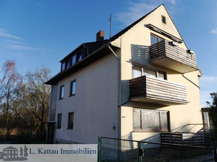 R 14 LESUM -gepflegte 4 Zimmer-Eigentumswohnung im 1. Obergeschoss -fest vermietet- mit Balkon und Garage-