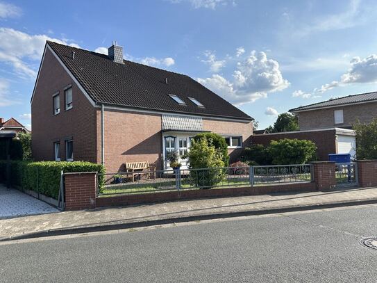 Kleinburgwedel: 2-Familienhaus mit Traumgarten und Garage