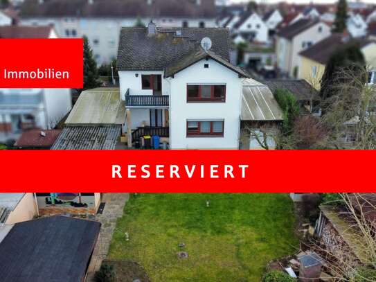 Zweifamilienhaus mit Traumgarten und vielen Optionen