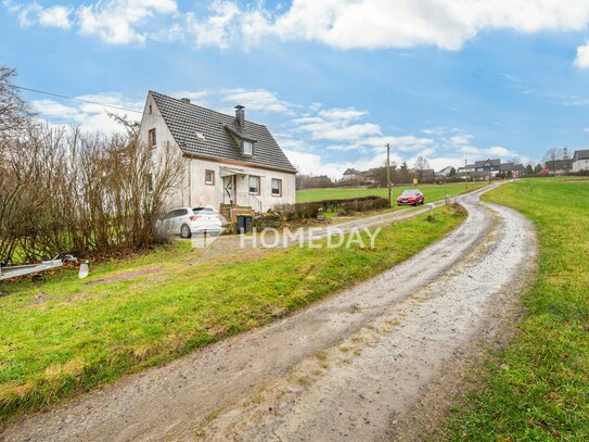 Charmantes Einfamilienhaus in idyllischer Hanglage mit großem Potenzial