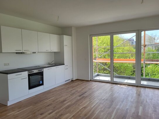 * 2 Zimmer in Neubau mit Balkon und EBK * SP mgl. * Bezug ab 12.2024 *