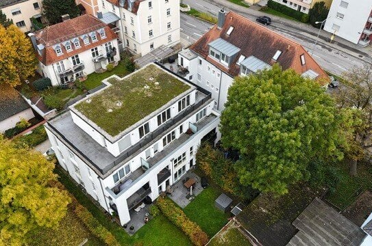 Zwei Mehrfamilienhäuser mit 21 Wohnungen und gemeinsamer Tiefgarage