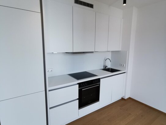 Stillvolle 3-Zimmer Wohnung in modernen Neubau mit EBK und Balkon