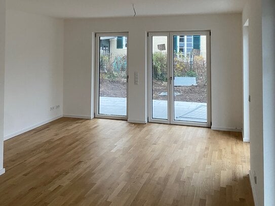 ERSTBEZUG 3+1-Zimmer // Neubau EG-Wohnung mit großer Terrasse + priv. Garten und großzügigem Souterrain // Trudering