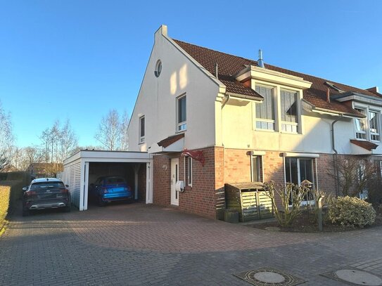 PURNHAGEN-IMMOBILIEN - Ritterhuder-Schweiz - Gepflegtes Reihenendhaus mit Carport in ruhiger Lage