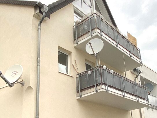 3-Zimmer-Wohnung mit überdachtem Balkon im 1. Obergeschoss / Tiefgaragenstellplatz