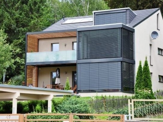 Lichtdurchflutete 4,5 Zi- Architekten-Maisonettewohnung im Zweifamilienhaus, mit Süd- Terrasse und Grünblick