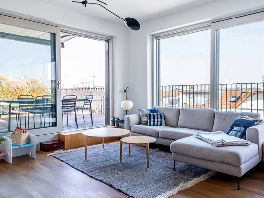 Lichtdurchflutete Maisonette-Wohnung mit Dachterrasse im Bötzowviertel