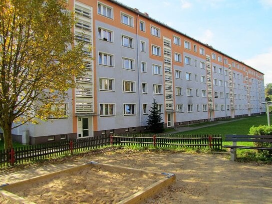 Familienfreundliche Wohnung mit Spielplatz am Haus