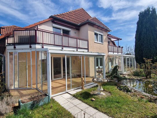 ETW mit Wintergarten, Gartenanteil und Carport in kleiner Anlage