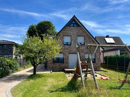 Einfamilienhaus mit vermietbarer Einliegerwohnung im schönen Poppenbüttel