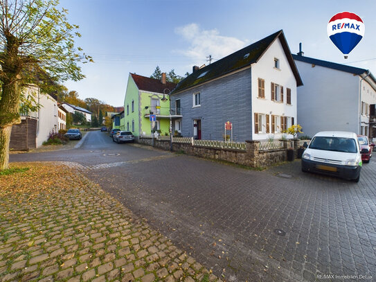 Mehrfamilienhaus mit Gewerbe