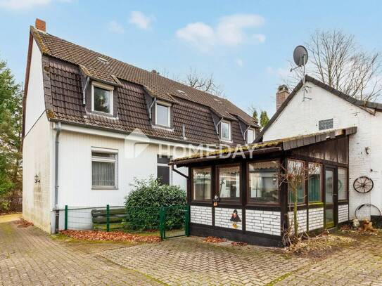 Mehrfamilienhaus mit 3 Wohneinheiten, großem Grundstück und Nebengebäude