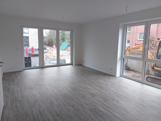 Neubau: Exklusive 4-Zi.-EG-Whg. (ca. 106,71 m²) mit großer Terrasse + TG-Stellplatz in zentraler, ruhiger Wohnlage