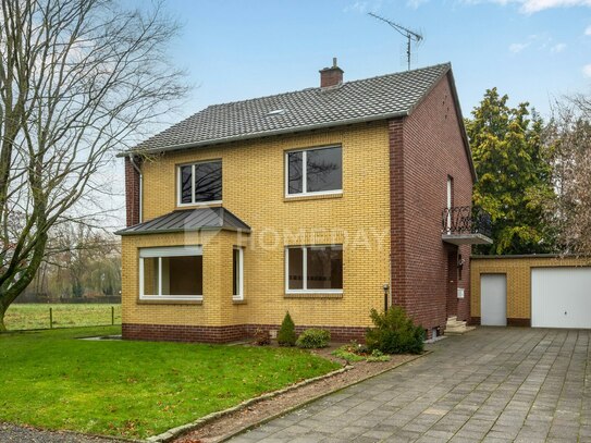 Einziehen und Wohlfühlen! Einfamilienhaus mit großem Grundstück, Garten, Terrasse und Garage