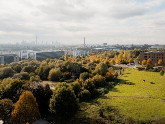 Skyline- und Parkblick: Helle 3-Zimmer-Wohnung mit einzigartiger Eck-Loggia