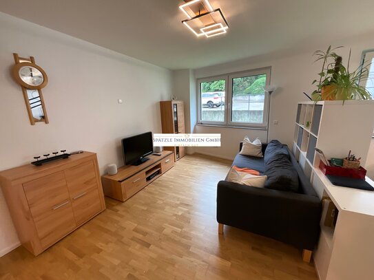 Sehr schöne Terrassenwohnung mit TG-Stellplatz und Garten