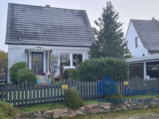 Schönkirchen-vermietetes kleines Einfamilienwohnhaus mit Anbau + Carport !