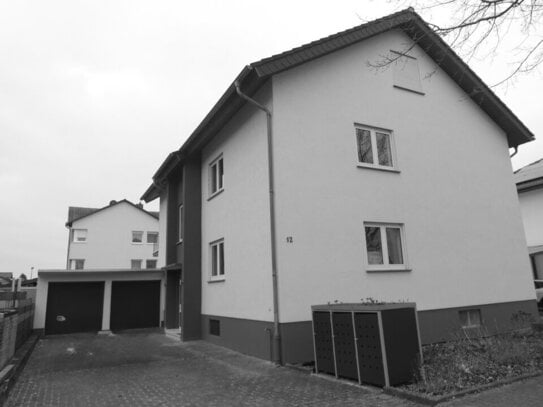 Geräumiges Zwei-Familienhaus mit Traumgarten und Garage!