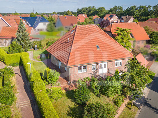 Gepflegter ebenerdiger Bungalow nebst massiver Garage und Werkstatt/Geräteraum in Haren-Wesuwe!