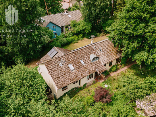 Ein Haus viele Möglichkeiten! Ein- oder Zweifamilienhaus in schöner Lage mit großem Grundstück in Hanglage