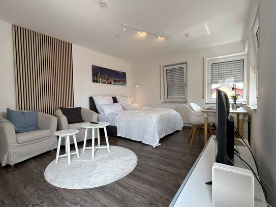 1-Zimmerwohnung mit TV, Wlan, Küchenzeile, Dusche/Wc, Waschmaschine, Trockner, Parkplatz und Balkon