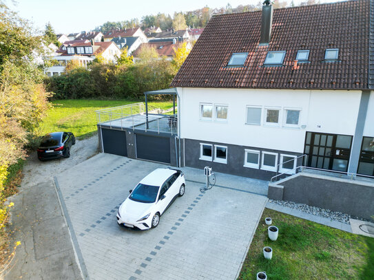 Familienidyll: Großzügiges Haus mit Garten, 2 Garagen und E-Ladestation in Top-Lage!