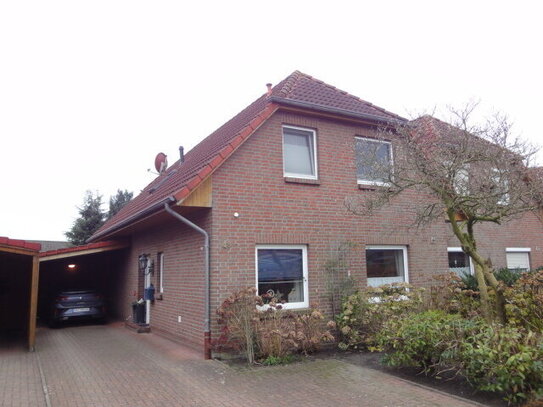 Charmante DHH mit Carport und liebevoll gestaltetem Garten in ruhiger Lage von Zetel