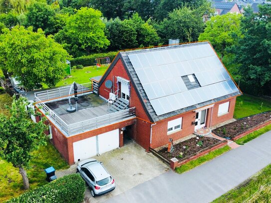 *Ein echter Hingucker* schicke Wohnung mit großer Dachterrasse und Garage in Neuenkirchen