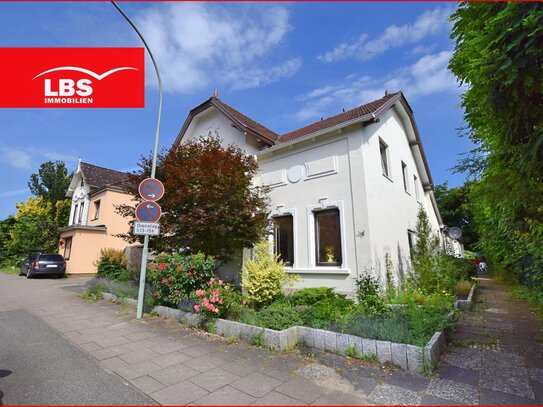 Historisches Zweifamilienhaus mit Gewerbeanbau in Zentrumslage