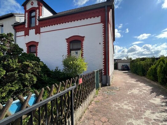 Doppelhaushälfte mit Bauland im Ortskern von Ehmen