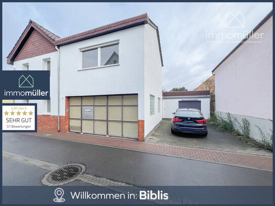 Zweifamilienhaus mit Garage und viel Abstellfläche in Biblis!