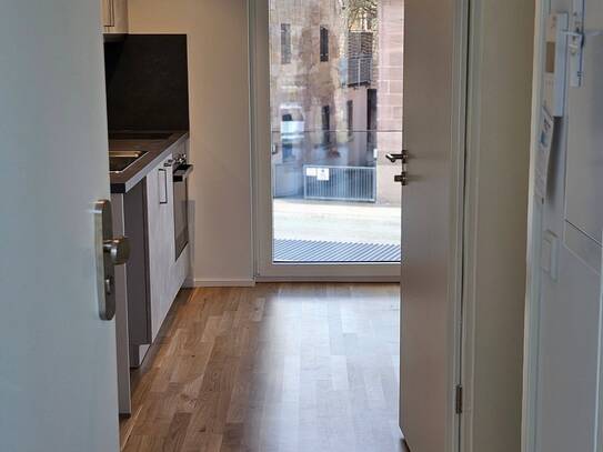 1 Zimmer Apartment, Neubau, Erstbezug, mit hochwertiger Küche, teilmöbliert, Stellplatz, Keller, Fahrradabstellplätze
