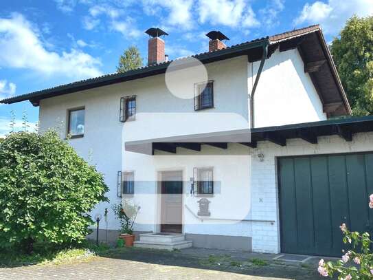 Paradiesischer Garten mit charmanten Einfamilienhaus