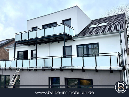 Moderne Neubauwohnung im OG mit großzügigem Südbalkon in zentraler Lage von Bramsche zu vermieten