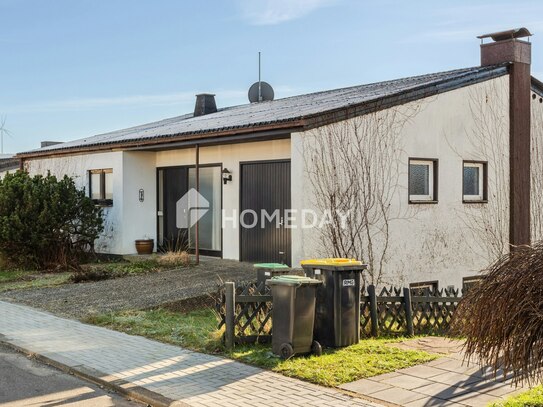 Wohnen mit Weitblick: Frei stehendes Einfamilienhaus mit überdachter Terrasse