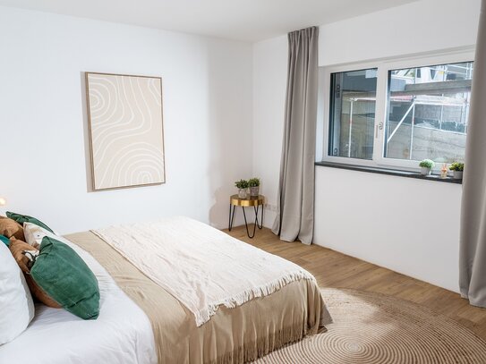 Erdgeschosswohnung mit Terrasse - Helle Neubau-2-Zimmer-Wohnung mit Einbauküche