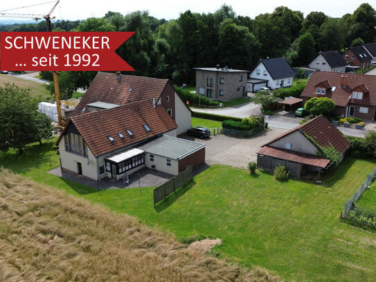 Wohnen oder vermieten in Bünde-Dünne! Dreifamilienhaus auf großem Grundstück + verpachteter Ackerfläche!