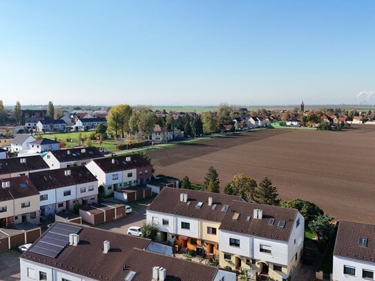 5,5% Rendite: Reihenmittelhaus mit Garage und Stellplatz