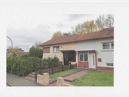 Lohfelden - Doppelhaushälfte und Carport in zentraler Lage