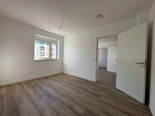 Moderne, helle Neubauwohnung mit Balkon