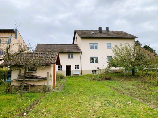 Großes Potenzial - Mehrfamilienhaus mit Baugrundstück in Freiburg-Tiengen