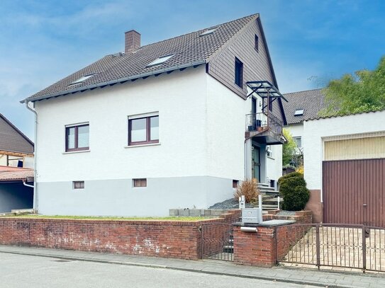 Wohnen und Vermieten - Zweifamilienhaus mit großem Garten in Reinheim!