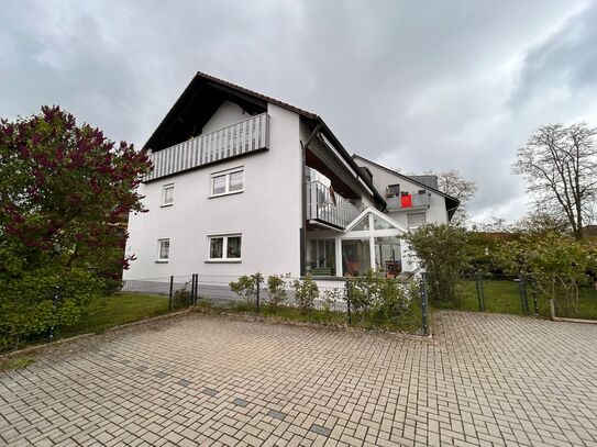 Frei werdende Erdgeschosswohnung mit Wintergarten, Garten, Garage