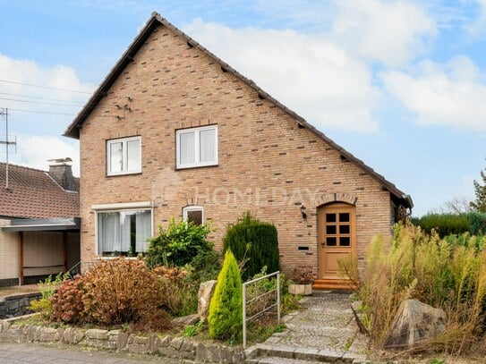 Attraktives Einfamilienhaus mit Terrasse, Gartenlaube, EBK und Garage in ruhiger Lage