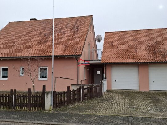 Charmantes Haus mit Einliegerwohnung, Ausbaupotenzial und Gartenidylle in 97342 Seinsheim